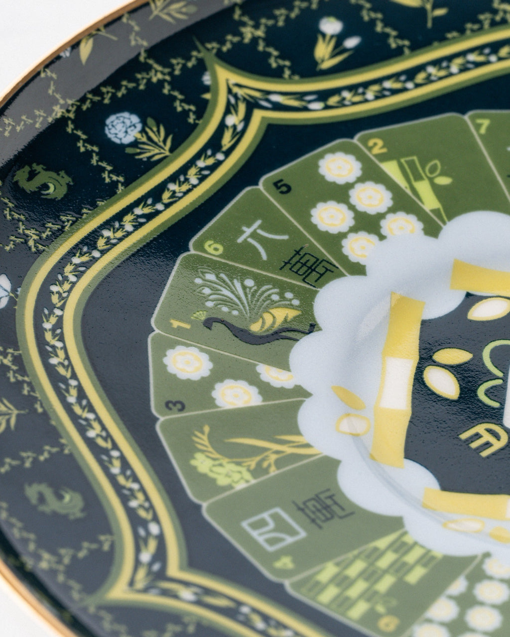 Duali ceramic teapot close-up showing intricate floral pattern and gold decorative detailing