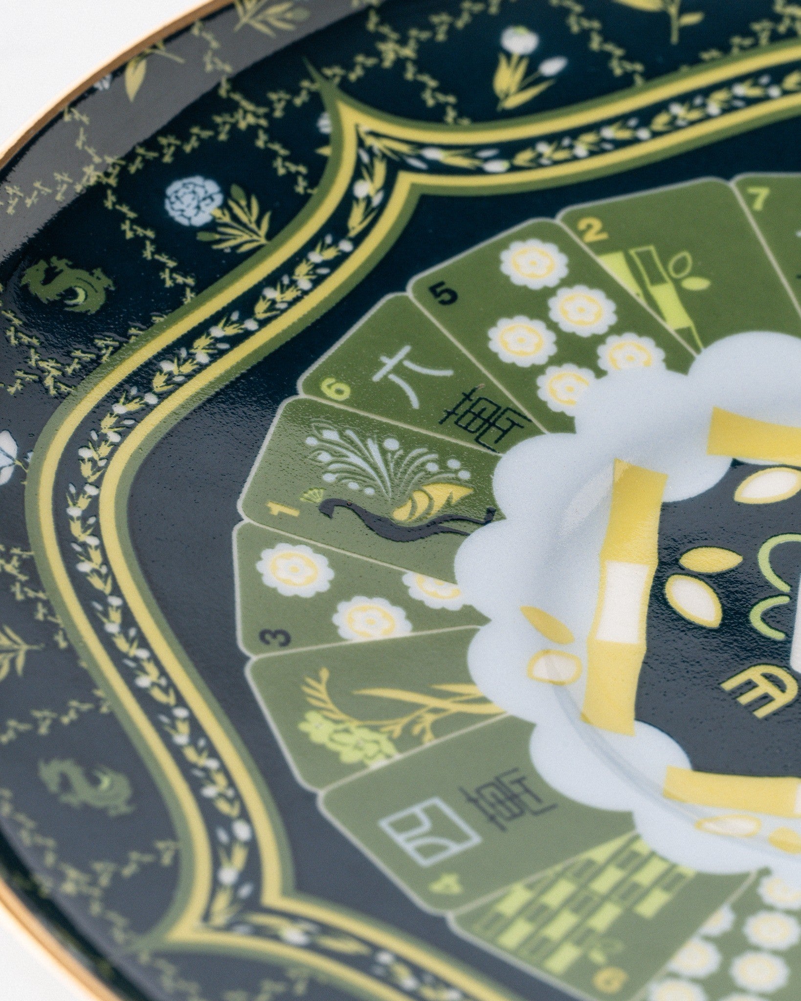 Duali ceramic teapot close-up showing intricate floral pattern and gold decorative detailing
