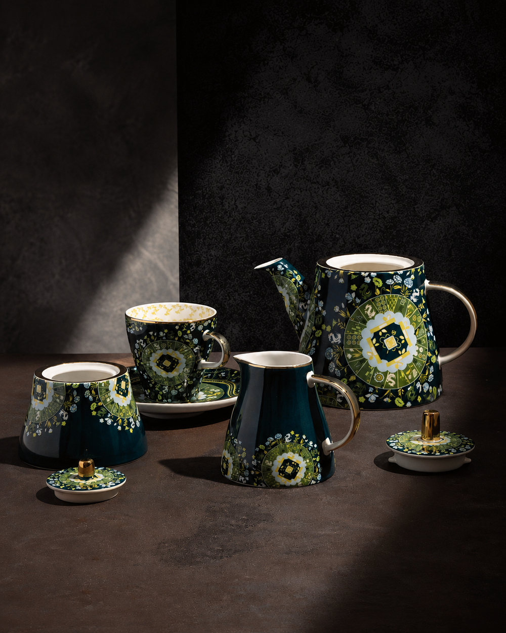 Duali floral-patterned ceramic tea set with teapot, teacups and serving pieces in a luxury setting