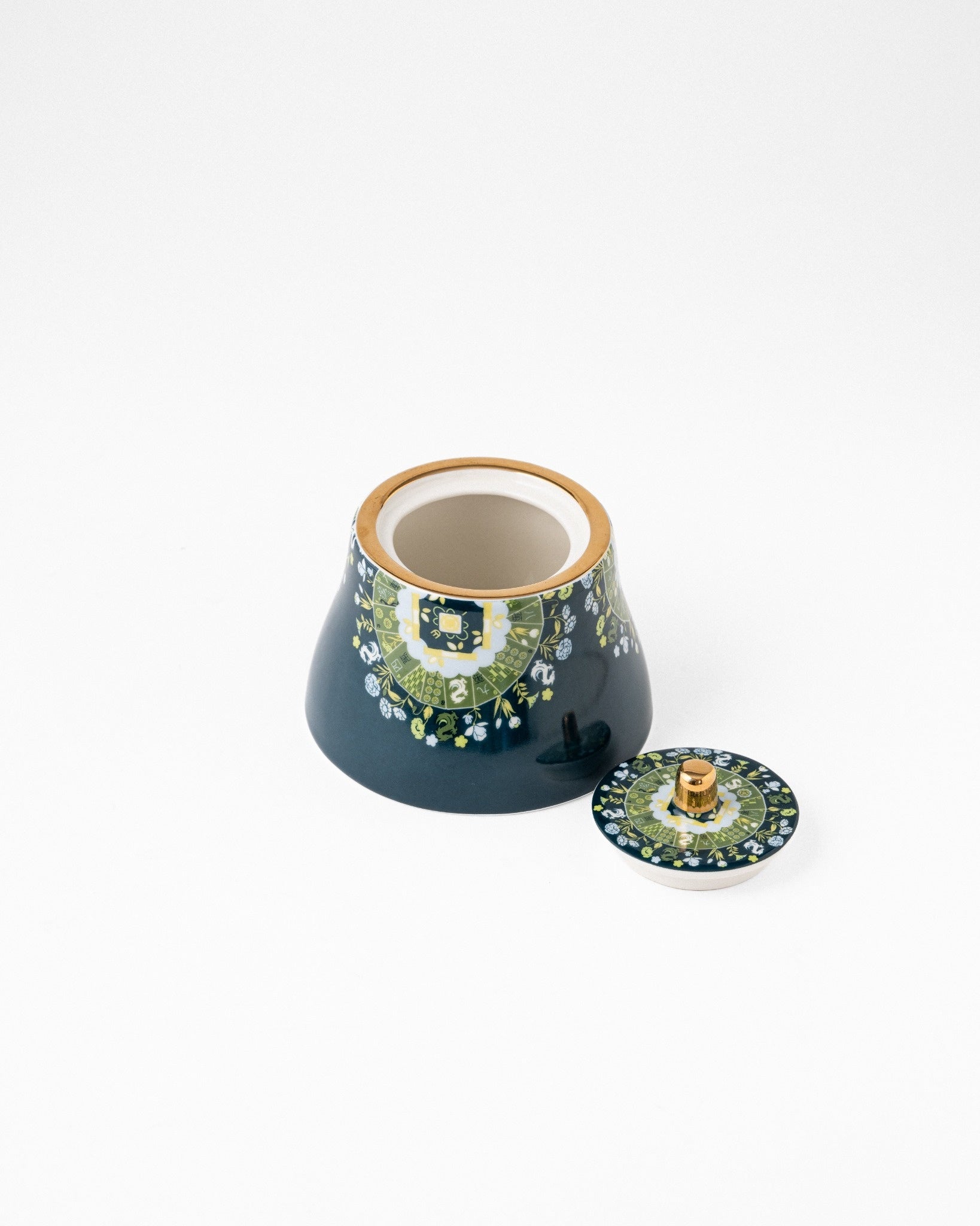 Duali floral-patterned ceramic teapot with lid removed and gold detailing